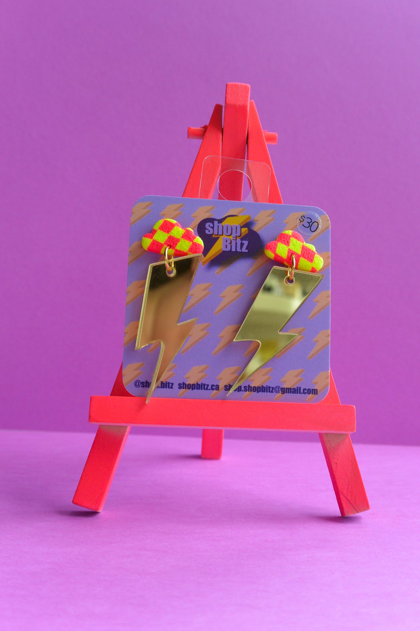 Checkered Cloud Mirrored Gold Lightning Bolts