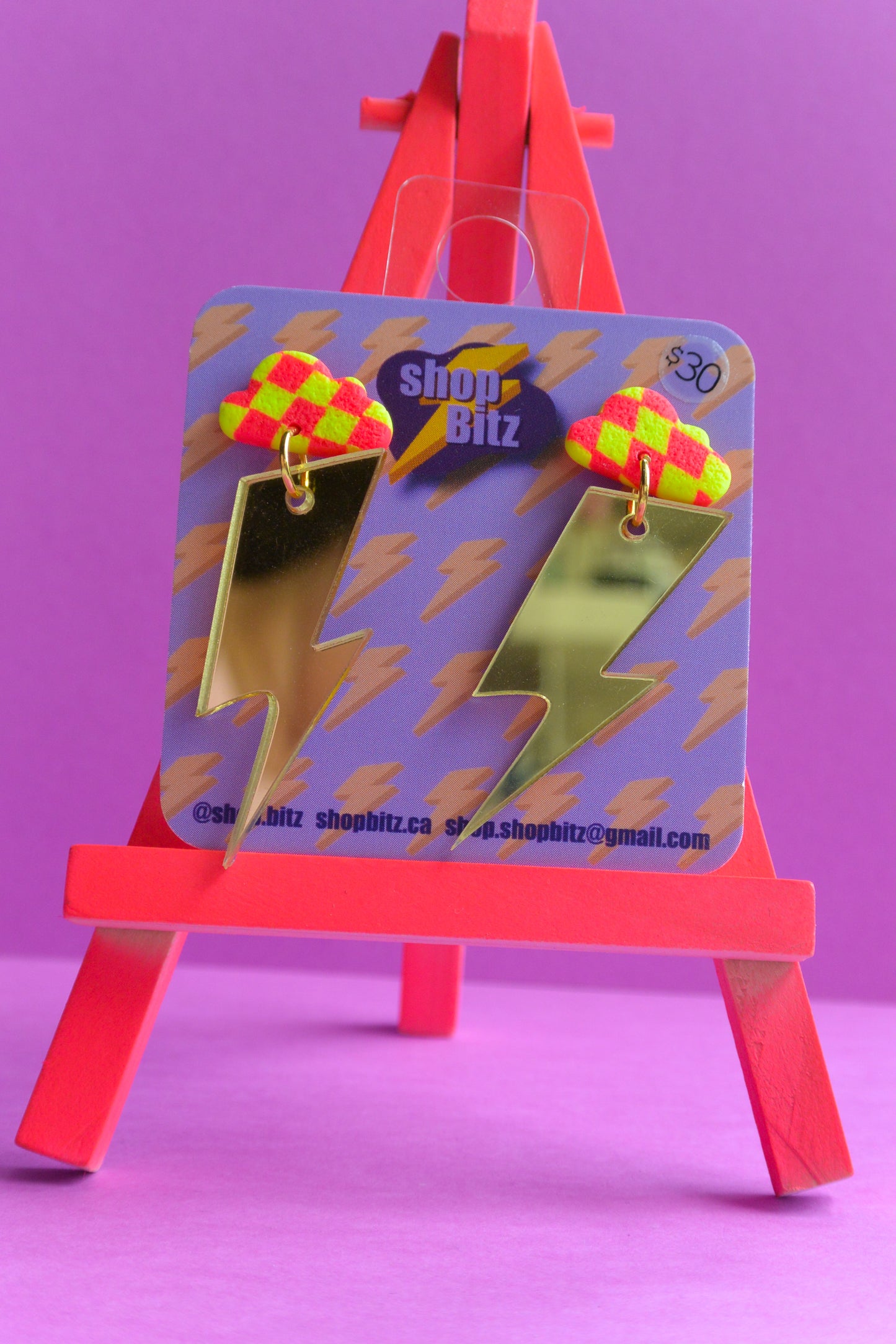 Checkered Cloud Mirrored Gold Lightning Bolts