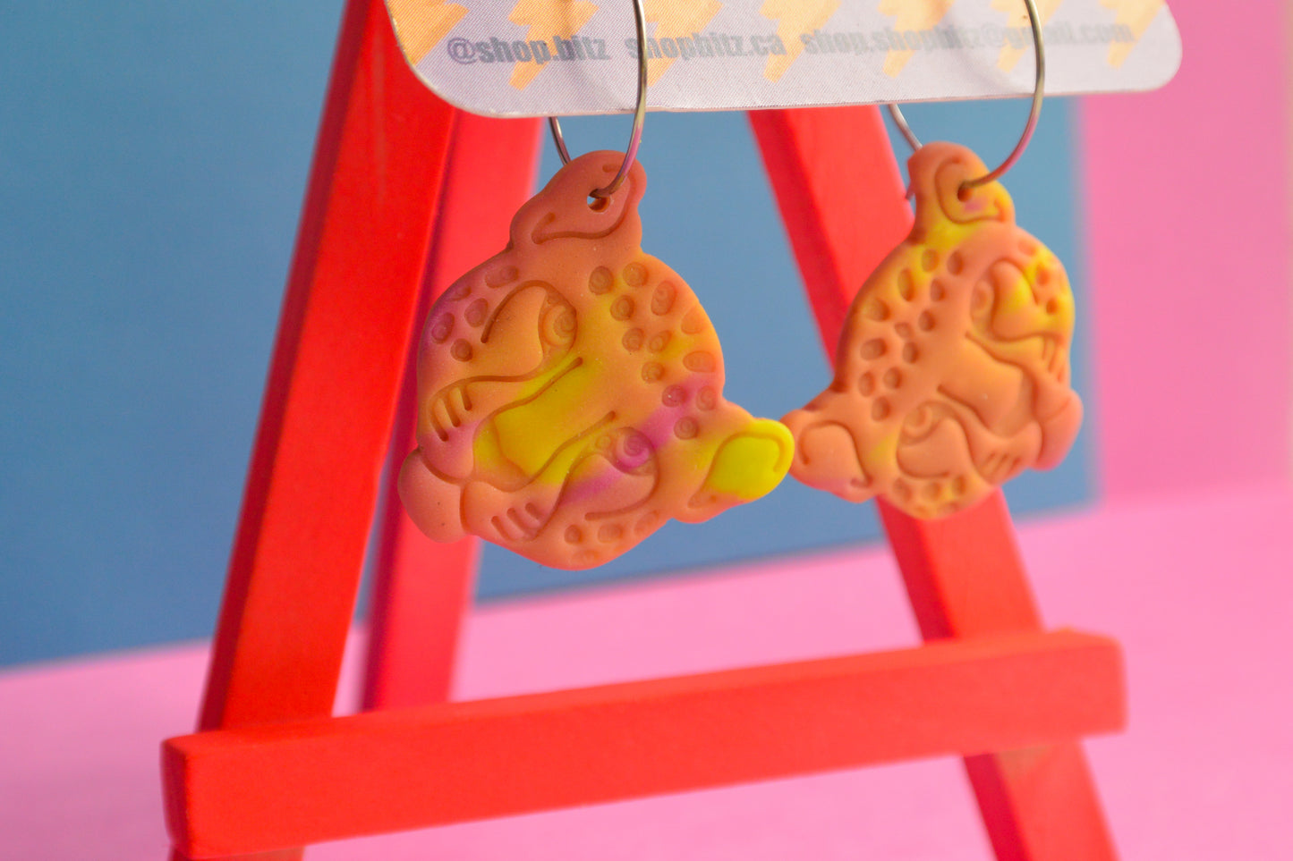 Orange and Yellow Jaguar Heads