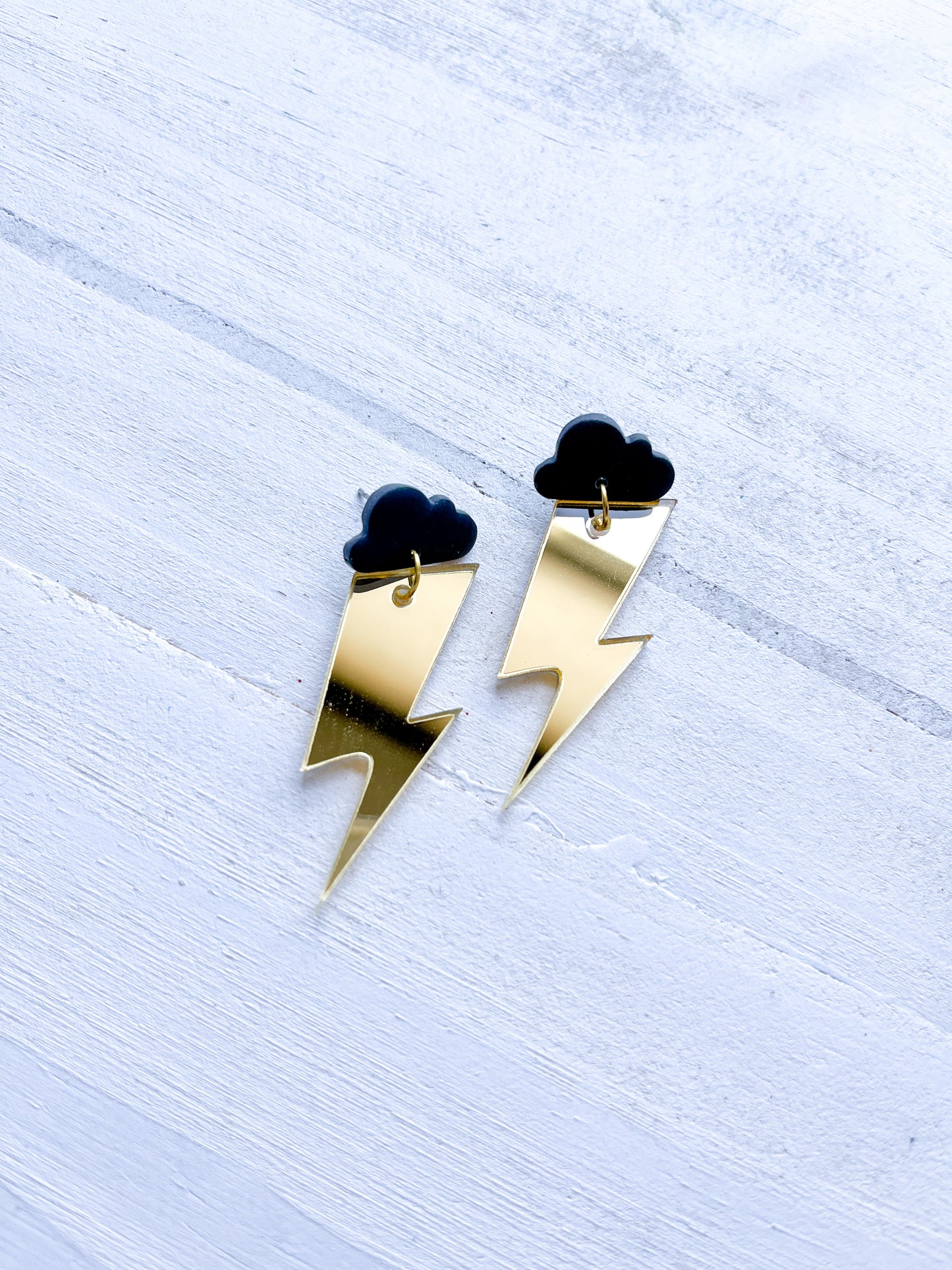 Mirrored Gold Lightning Bolts